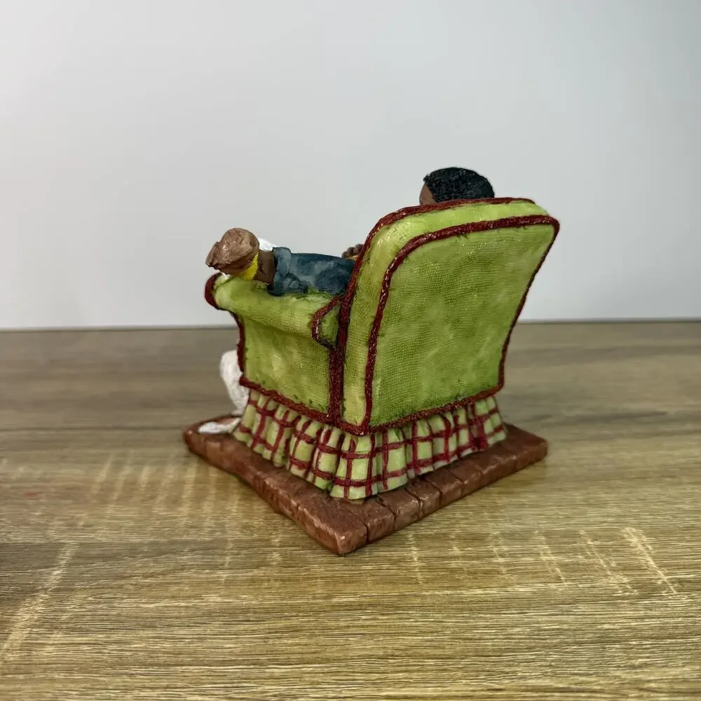 Vintage Boy Figurine Sitting On Chair with Saxophone and Dog Figure
